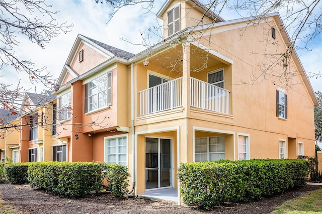 exterior space featuring a balcony