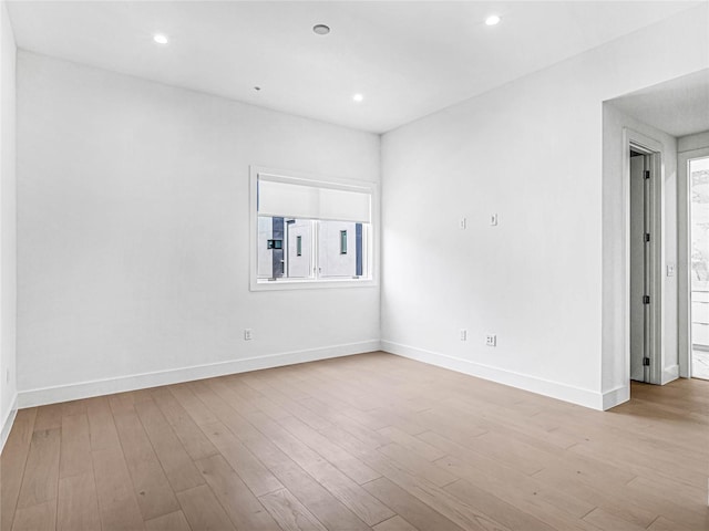 empty room featuring light hardwood / wood-style floors