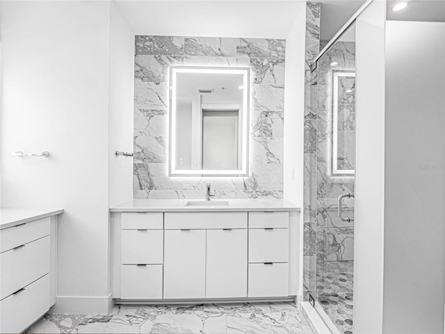 bathroom with vanity and walk in shower