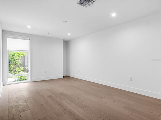 empty room featuring light hardwood / wood-style floors