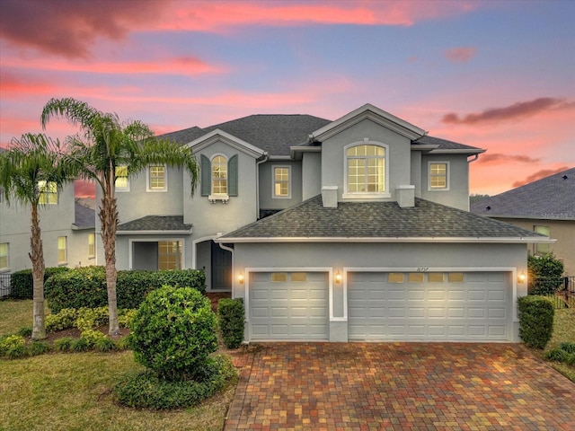 front of property with a garage