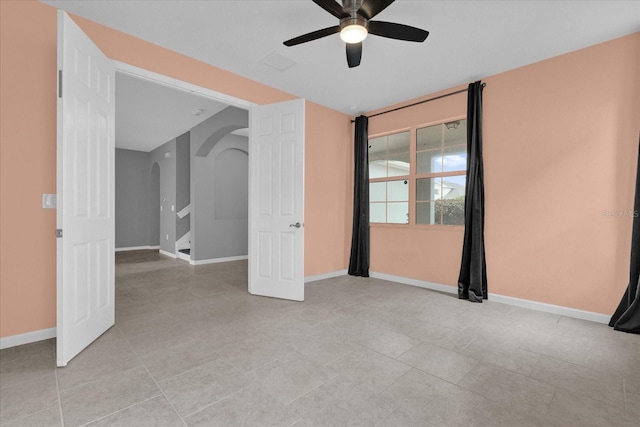 unfurnished bedroom with ceiling fan