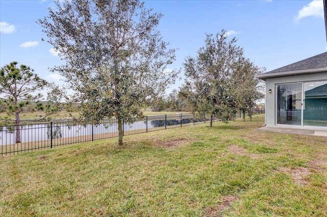 view of yard with a water view