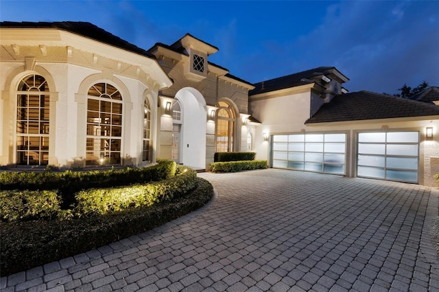 view of front of property with a garage