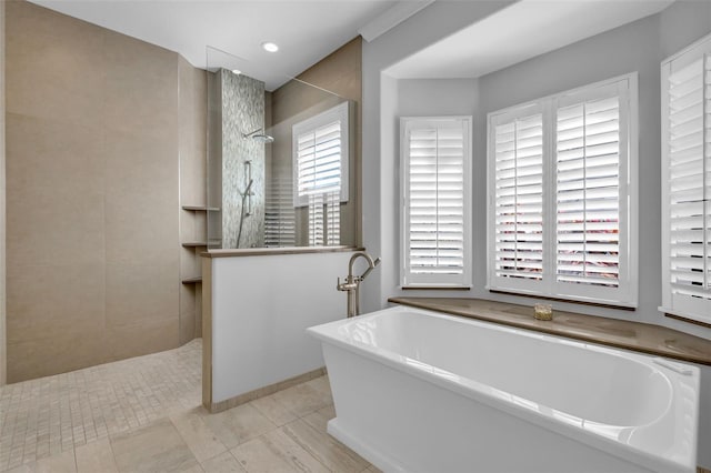 bathroom with tile patterned flooring and independent shower and bath