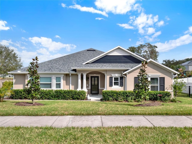 view of front of property with a front lawn