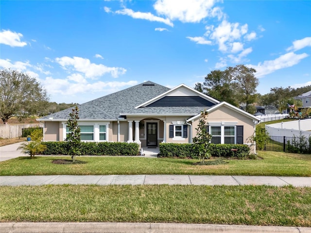 view of front facade featuring a front yard