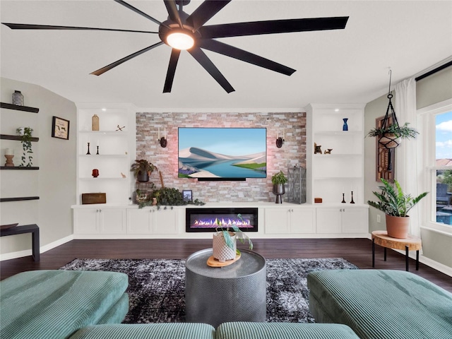 living room with ceiling fan, built in features, and dark hardwood / wood-style flooring