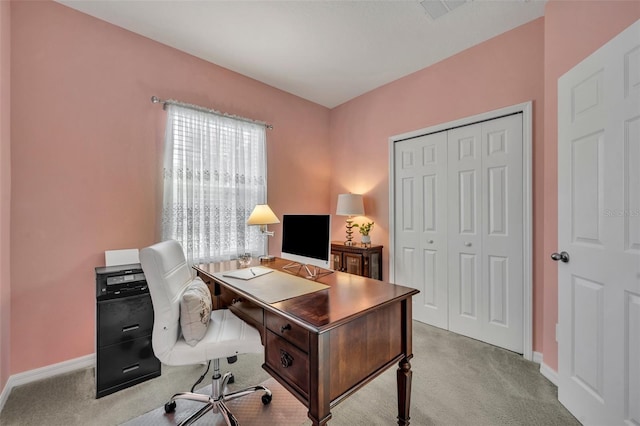 home office with light colored carpet