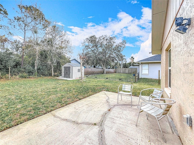 view of patio featuring a storage unit