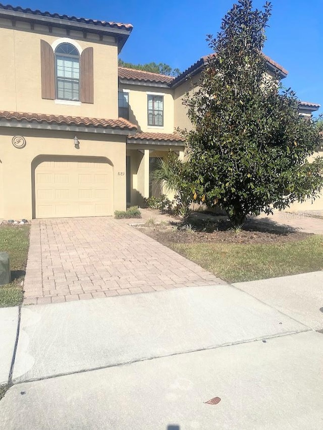 view of front of property with a garage