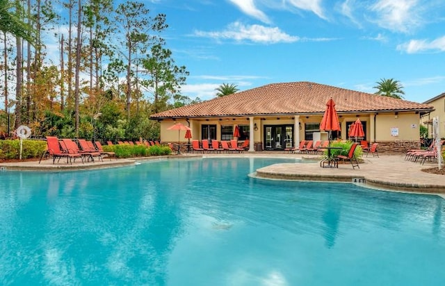 pool with a patio