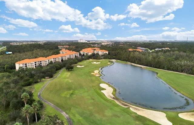 bird's eye view with view of golf course and a water view