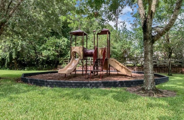 community play area featuring a yard