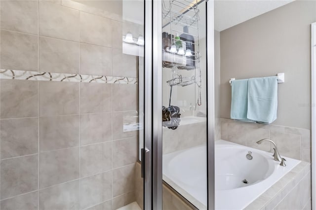 bathroom featuring plus walk in shower