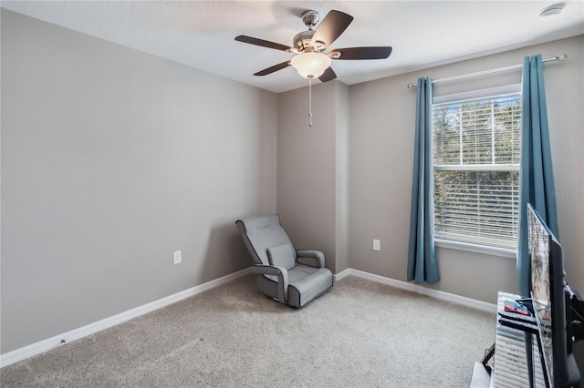 unfurnished room featuring carpet and ceiling fan