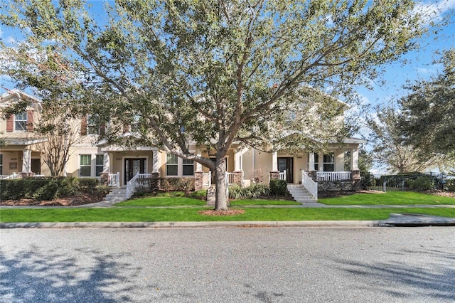 view of front of home with a front lawn