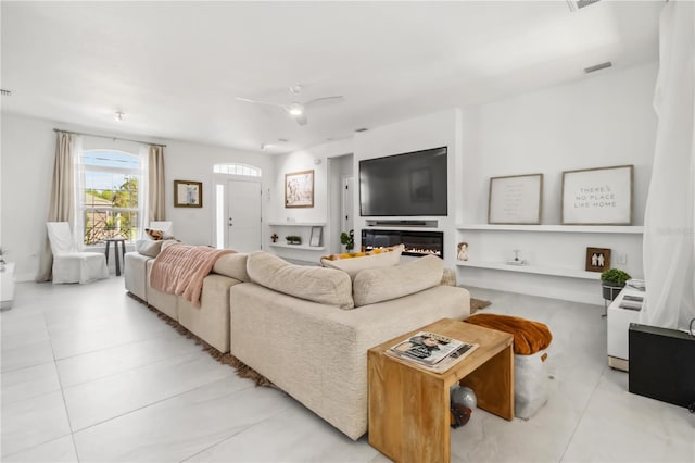 living room featuring ceiling fan