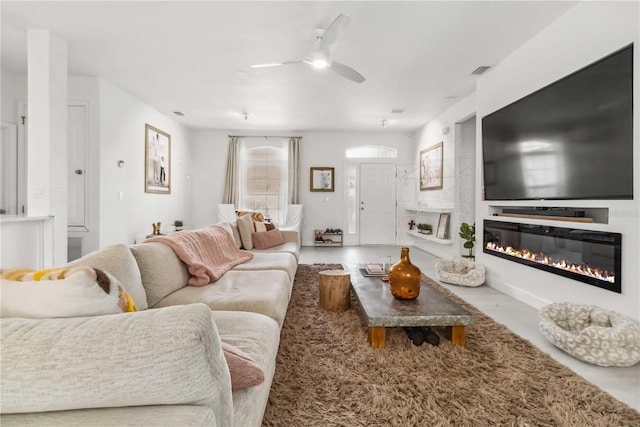 living room with ceiling fan