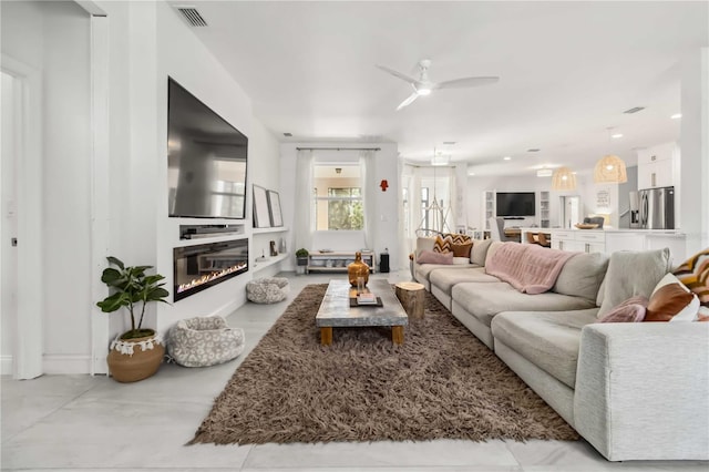 living room with ceiling fan