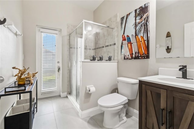 bathroom with an enclosed shower, vanity, tile patterned flooring, and toilet