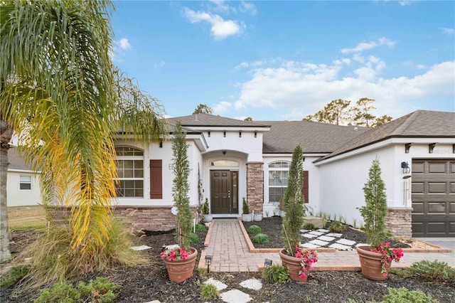 view of front of property with a garage