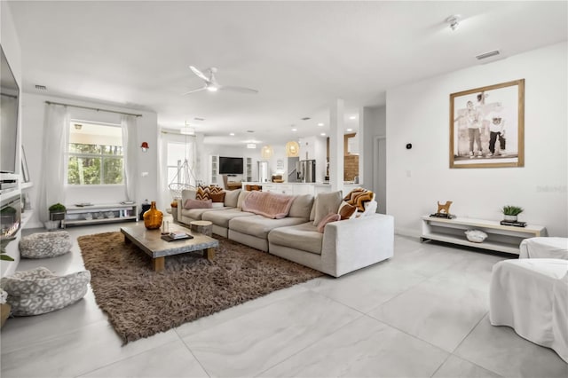 living room featuring ceiling fan