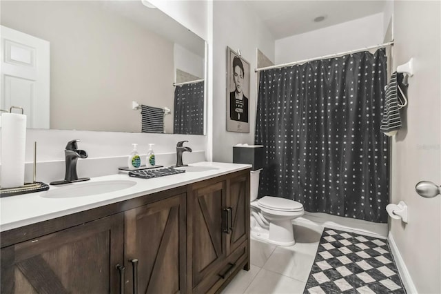 bathroom featuring vanity, a shower with curtain, and toilet