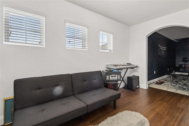 living room with dark wood-type flooring