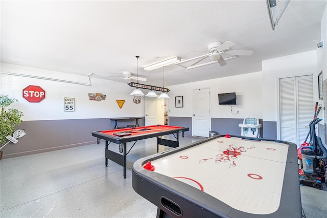 recreation room featuring ceiling fan, pool table, and a textured ceiling