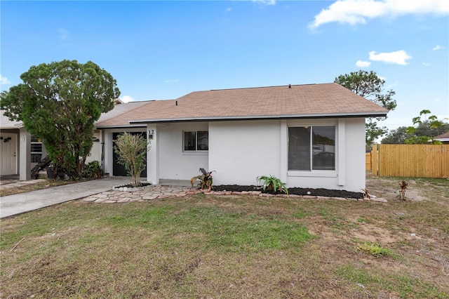 back of house with a yard