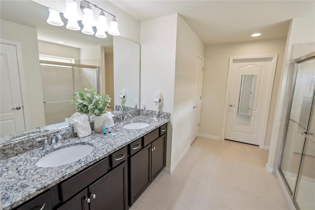 8896 Bengal Ct, Kissimmee, FL 34747 - bathroom featuring vanity and walk in shower