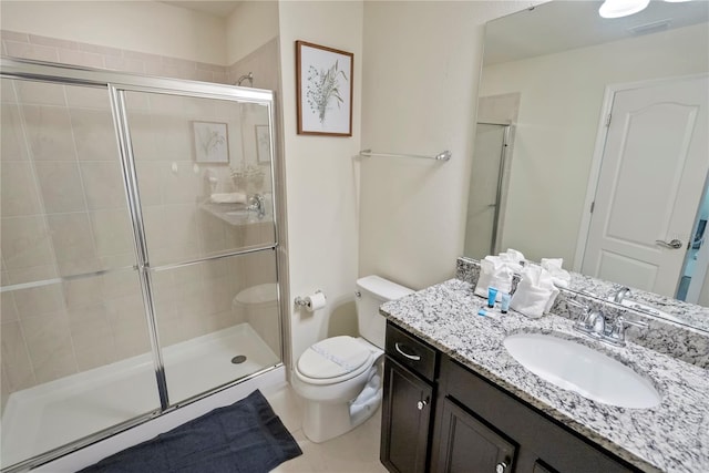 8896 Bengal Ct, Kissimmee, FL 34747 - bathroom with an enclosed shower, vanity, and toilet