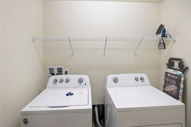8896 Bengal Ct, Kissimmee, FL 34747 - laundry area with washing machine and clothes dryer