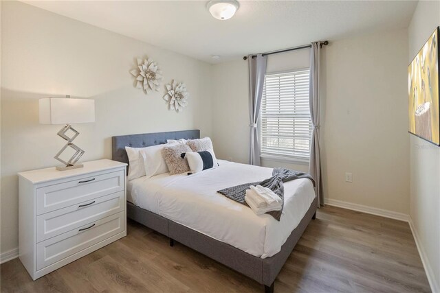 8896 Bengal Ct, Kissimmee, FL 34747 - bedroom featuring light hardwood / wood-style floors