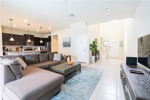 living room featuring light tile patterned floors