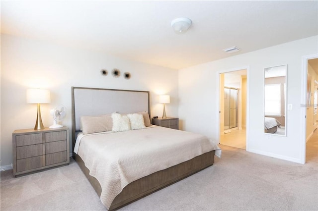 bedroom featuring light colored carpet