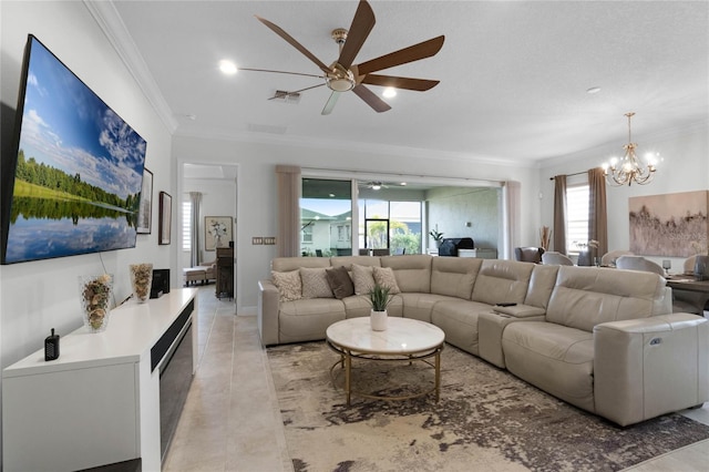 living room featuring ceiling fan with notable chandelier and ornamental molding