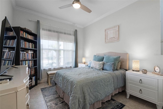 tiled bedroom featuring ornamental molding and ceiling fan