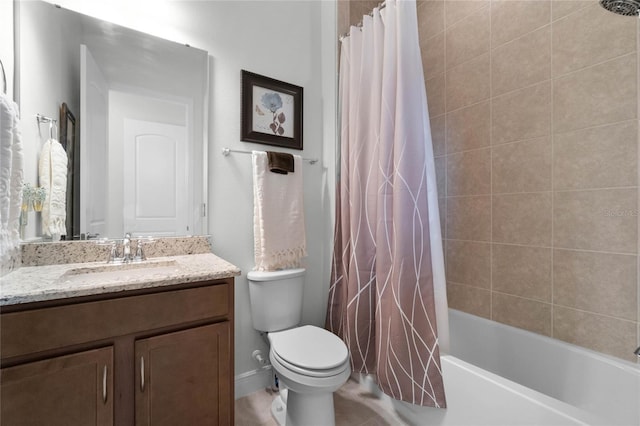 full bathroom featuring vanity, shower / tub combo, and toilet