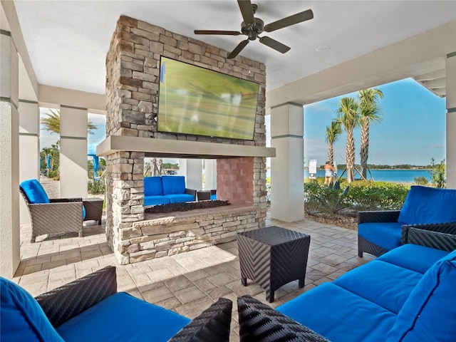 view of patio with ceiling fan and an outdoor hangout area