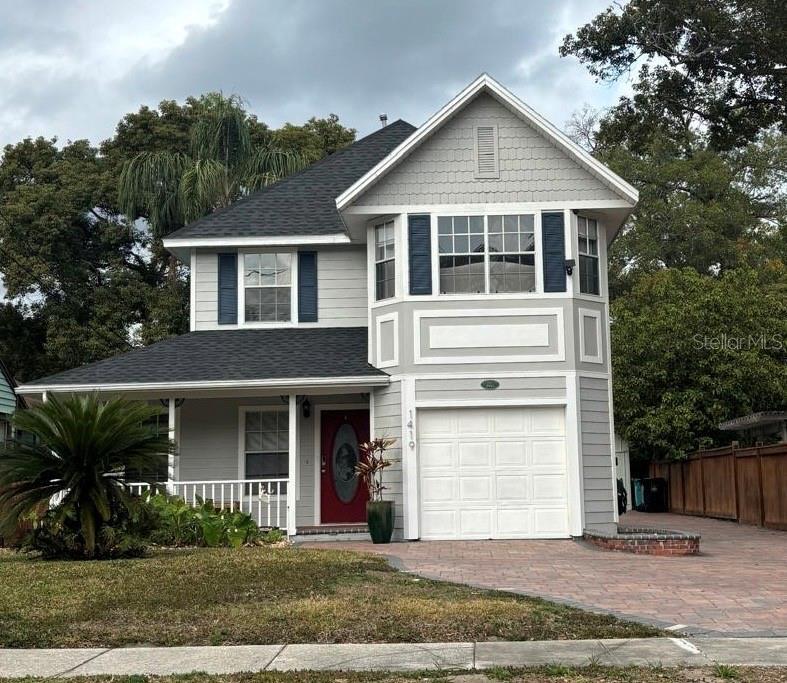 view of front of property with a garage