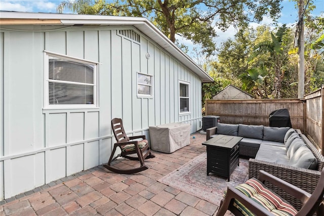 view of patio with an outdoor hangout area and central air condition unit