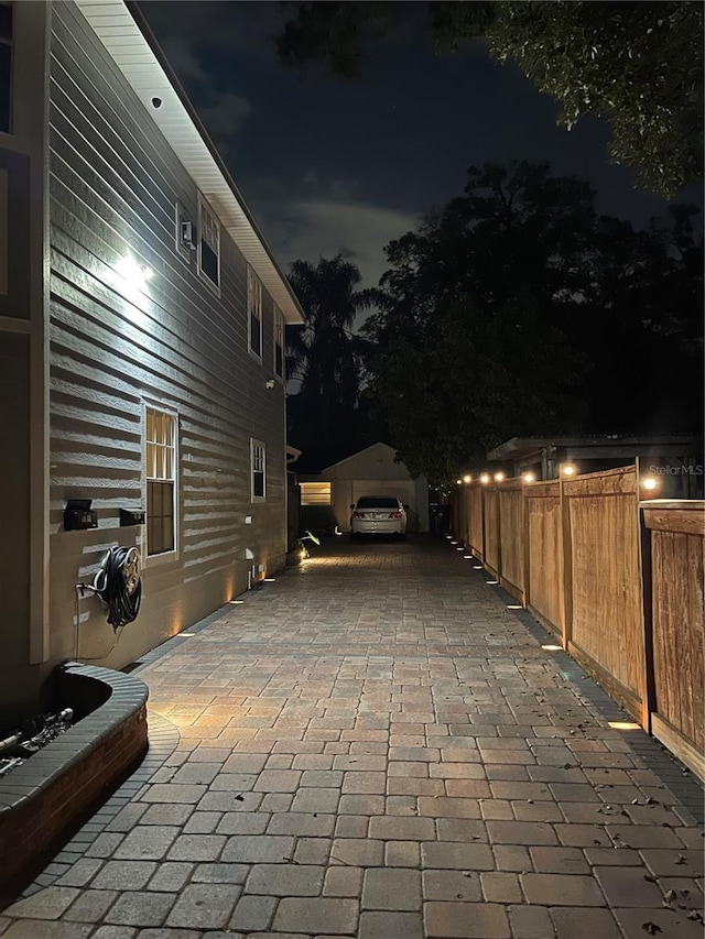 view of patio at twilight