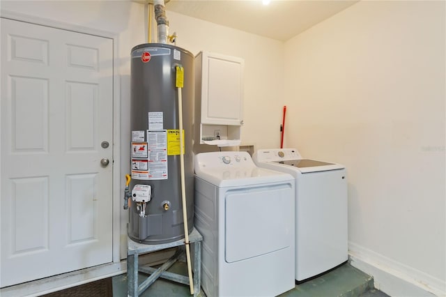 washroom with separate washer and dryer and gas water heater