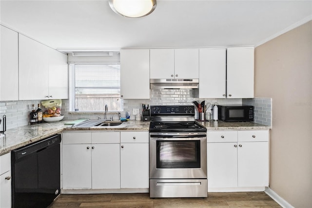 kitchen with tasteful backsplash, sink, white cabinets, and black appliances