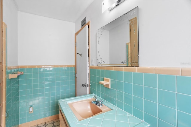 814 S Lakeshore Blvd, Lake Wales, FL 33853 - bathroom with vanity, tile patterned flooring, and tile walls