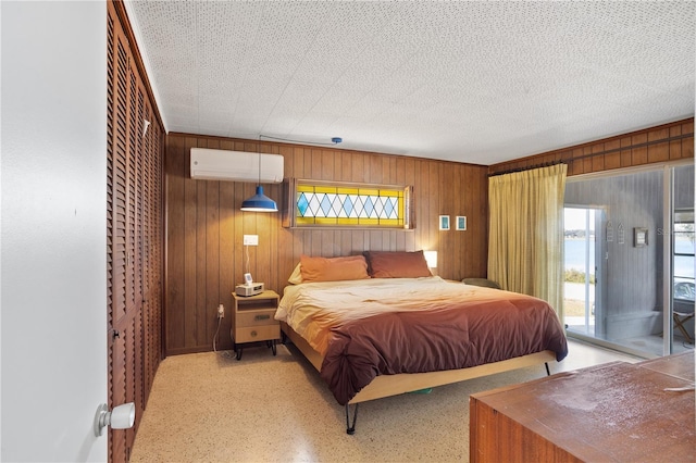 814 S Lakeshore Blvd, Lake Wales, FL 33853 - bedroom with multiple windows, access to outside, an AC wall unit, and a textured ceiling