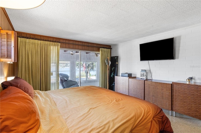 814 S Lakeshore Blvd, Lake Wales, FL 33853 - bedroom with access to exterior and a textured ceiling