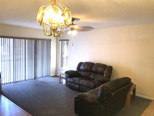 living room with a chandelier and a textured ceiling